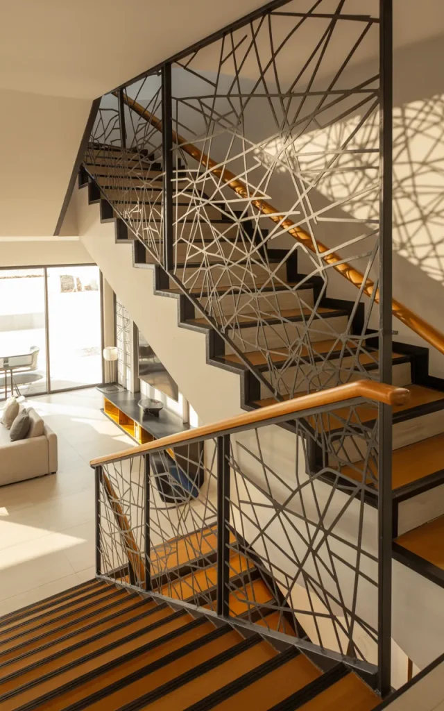 Use laser-cut metal panels as a feature railing