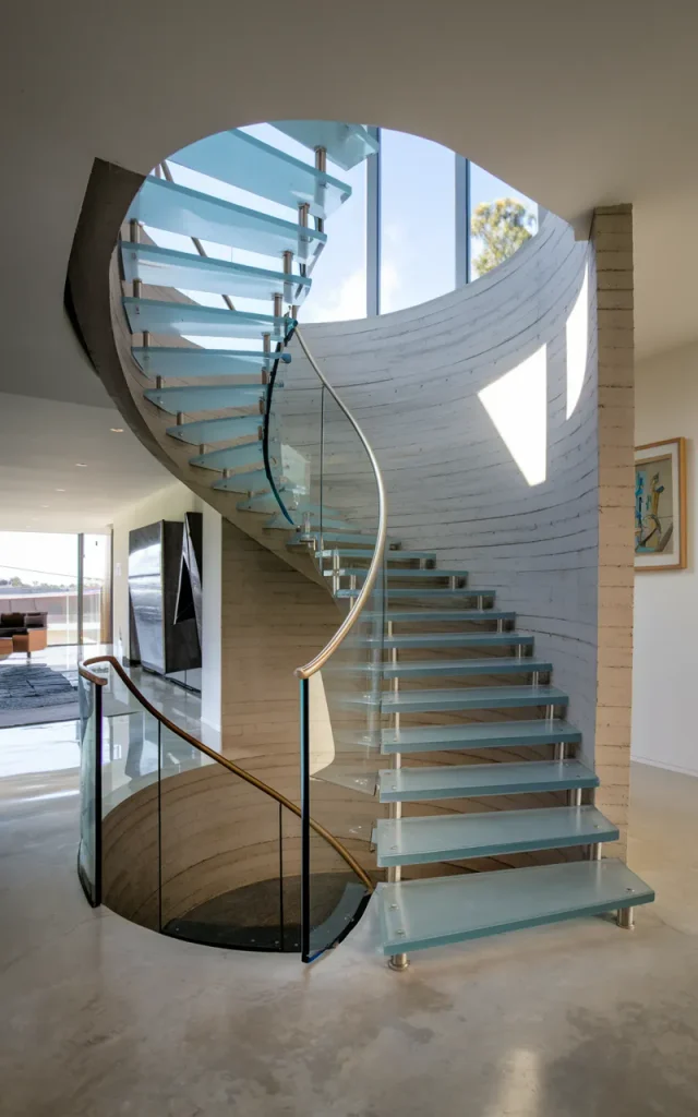 Build a sculptural glass staircase wall feature 🧩